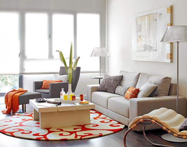 Màu cam kết hợp với nâu ghi tạo ra một không gian phòng khách ngập tràn sắc thu