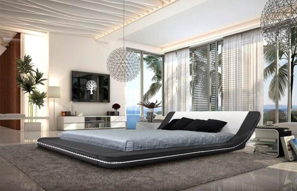 Giường lớn được bọc nệm êm từ da tự nhiên với một dải đèn led quanh thân. ​ Chiếc giường khá hoàn hảo với vẻ đẹp tinh tế, hiện đại.