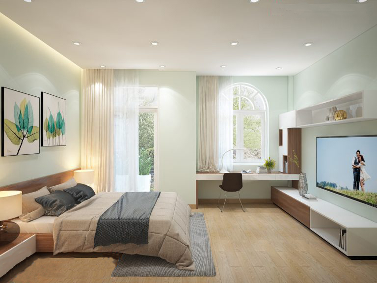 Phòng ngủ master đón được nhiều ánh sáng tự nhiên với cửa sổ vòm lớn chạy dọc tường