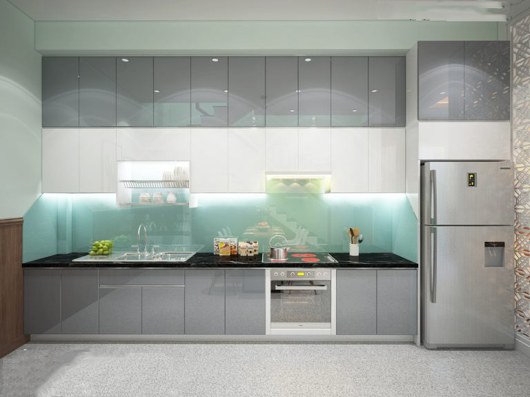 Hệ bếp chạy dọc theo tường với gam màu xám - xanh dịu làm chủ đạo, tạo cảm giác trang nhã cho khu vực nấu nướng 