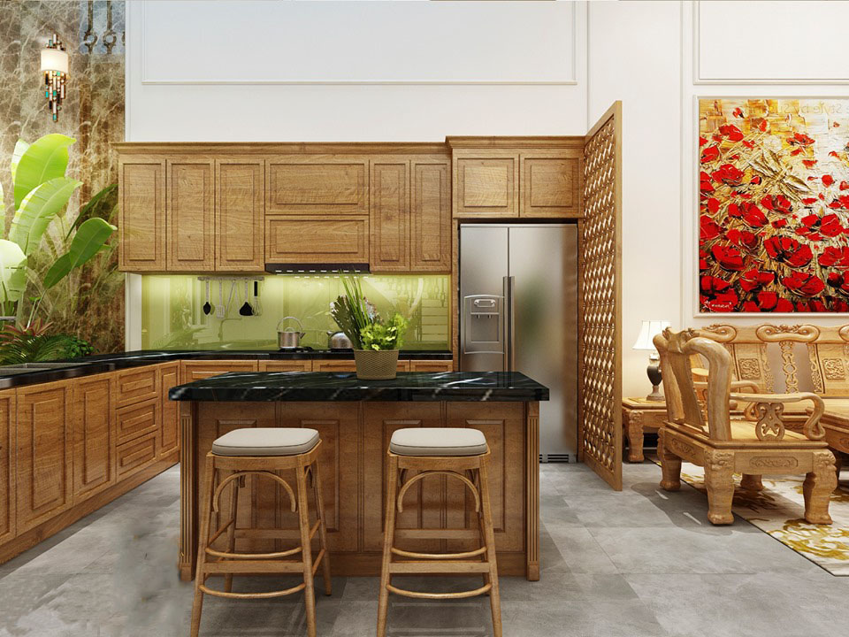 Phân chia giữa khu vực phòng khách và bếp ăn là tấm vách bằng gỗ thưa. Hệ tủ bếp có hình chữ L và vẫn lấy chất liệu gỗ làm chủ đạo.