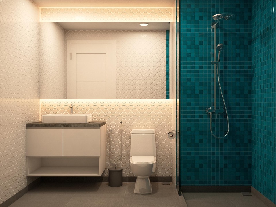 Gạch mosaic vảy cá màu trắng độc đáo có phần đối lập với mảng tường ốp gạch mosaic vuông xanh sang trọng nhưng đều đảm nhận tốt chức năng chống ẩm, chống thấm và thể hiện được cá tính của chủ nhân căn hộ