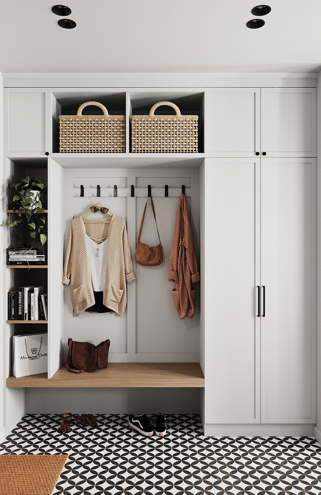 Hệ tủ lưu trữ và giá đỡ gắn liền với tường giúp kiệm diện tích tối đa cho căn hộ