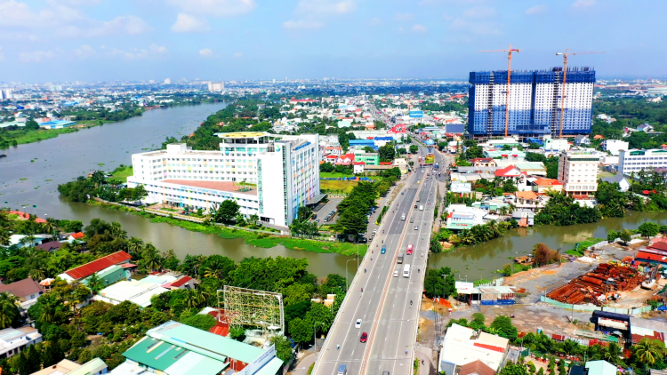 Nhà đất Thuận An, Dĩ An Lợi ngày càng thu hút sự quan tâm của người mua nhờ lợi thế về hạ tầng cùng vị trí giáp ranh TP.HCM. Ảnh minh họa 