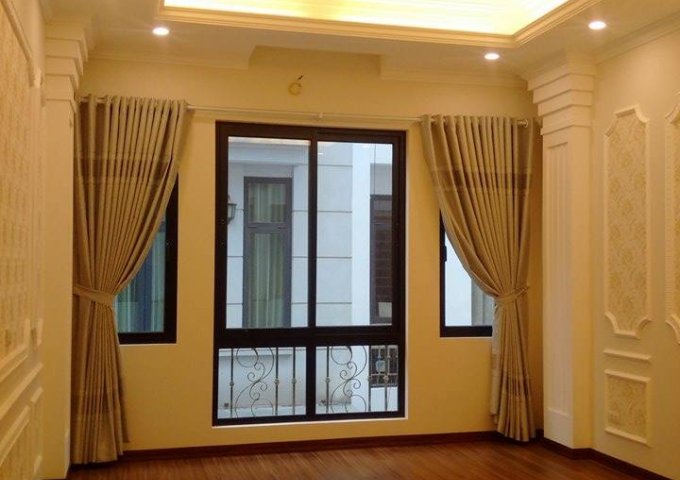 Bán nhà ngõ 55 Huỳnh Thúc Kháng, Láng Hạ, DT 50m2, 6 tầng, thang máy, ô tô vào nhà, giá 12.3 tỷ
