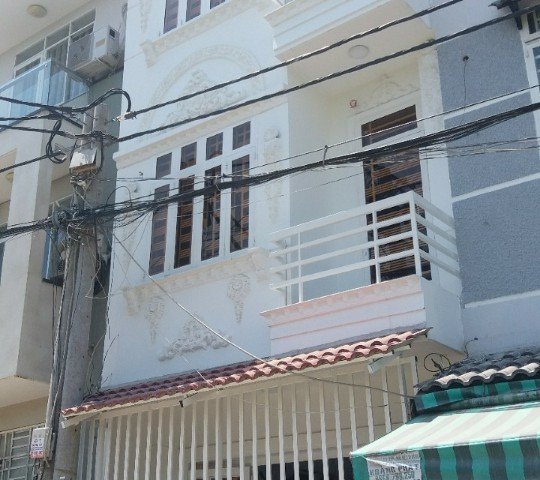 Bán nhà 1 trệt 2 lầu mặt tiền đường Nguyễn Thái Học,hướng Đông Nam.