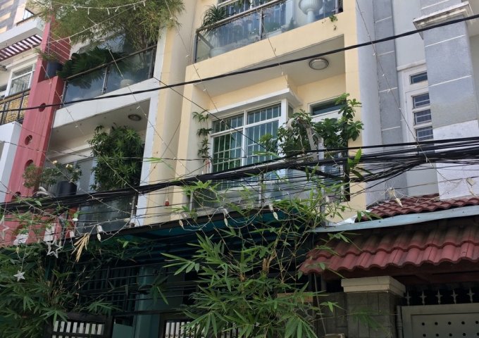 Định cư bán gấp căn nhà 4 lầu Phan Huy Ích P15 TB