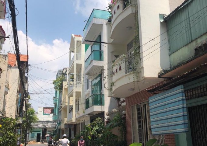 Định cư bán gấp nhà HXH đường Nguyễn Xí P26 Bình Thạnh, 4.5x13.5, 4 tầng.LH 0931255888
