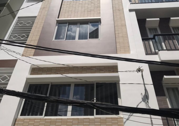 Cho thuê nhà MT Huỳnh Văn Bánh đoạn sầm uất Phú Nhuận. 4x25m, 4 tầng, 40tr/tháng. LH: 0908199609