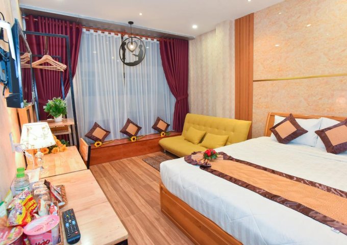 Bán khách sạn ngay bến Ninh Kiều , đường Lê Thánh Tôn , trệt 5 lầu , dt: 3,5x21 , nở hậu