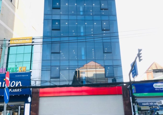Cần bán tòa nhà cao ốc văn phòng Măt tiền Huỳnh Tấn Phát, Q.7, DT : 10.8mx18m, 7 lầu, Giá : 43 tỷ