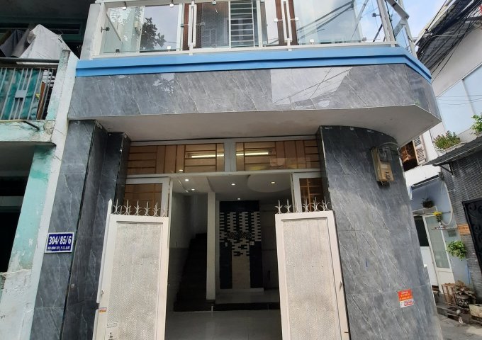 Nhà 2 tầng mới toanh, cách hẻm đường xe hơi Bùi Đình Túy, P.12, 30m