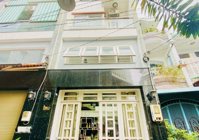 Hẻm xe tải F10 Tân Bình, 4x14M, Nhà mới 5 Tầng 6PN, giá quá tốt