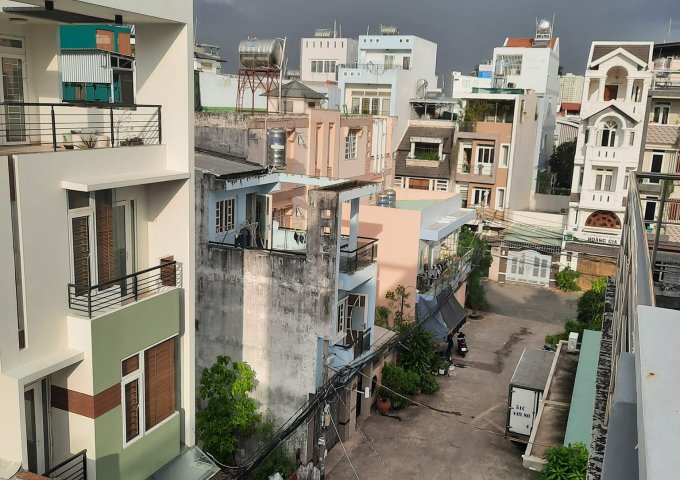 Nhà mới xây 4 Tầng khu Vip Kiều Đàm Quận 7, Xe hơi ngủ trong nhà